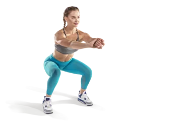 Gardinen Beautiful woman at the gym doing fitness exercises. Sports transparent background.  © vitaliy_melnik