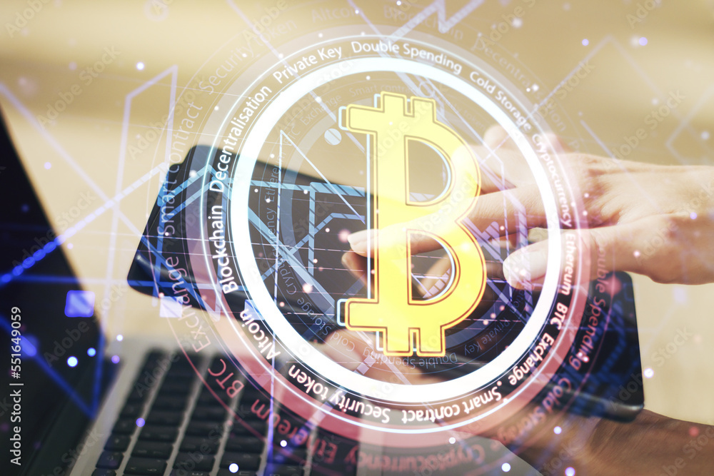 Poster double exposure of creative bitcoin symbol hologram and hand working with a digital tablet on backgr