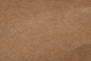 Texture of kraft paper sheet as background, closeup