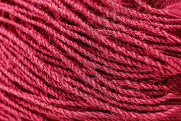 Technical ropes in a roll. Grunge Magenta color texture