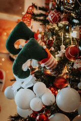 Elf legs decorations on a Christmas tree
