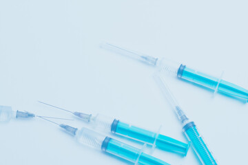 Medical syringe on a white background. A syringe for injection. The concept of health and beauty