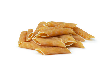 uncooked whole grain pasta on white background