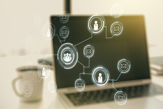 Double exposure of social network icons concept with modern laptop on background. Marketing and promotion concept