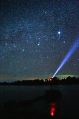 lonely man in middle of the dark in a lake with sky full of stars, monte escobedo zacatecas 
