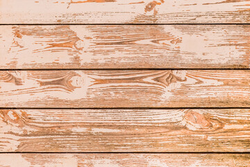 Brown planks of fence surface with natural pattern, wood texture background
