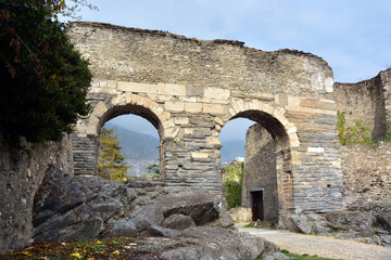 Fototapeta na wymiar Susa, Piedmont, Italy -10-22-2022- The ancient Roman aqueduct dating back to the 4th century AD