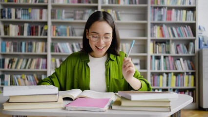 Asian student rejoices finding answer to difficult question