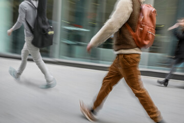 Abstract image of people in motion with blurred background