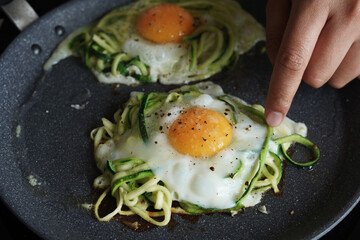 fried eggs in a pan