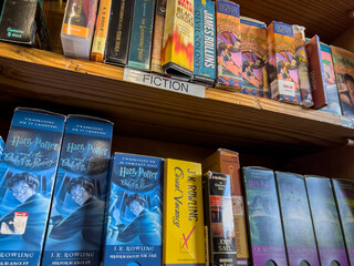 Fototapeta premium Redmond, WA USA - circa November 2022: Close up view of used audiobooks for sale inside a Half Price Books.