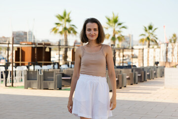 Portrait of a young stylish woman in a cafe