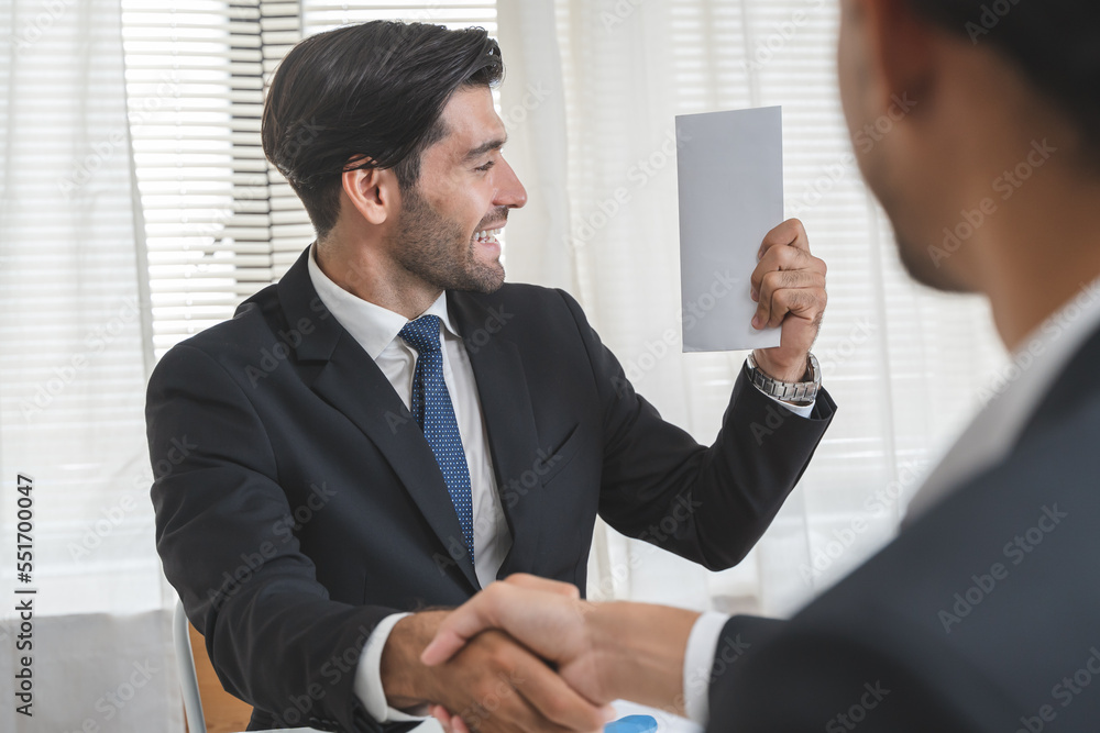 Wall mural Close up view of office worker receiving salary from boss.