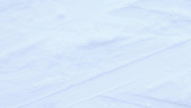 Snow skiing track surface loop. Ski trail texture. Ski run traces background.