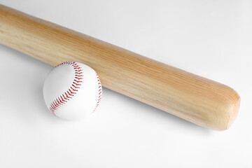 Wooden baseball bat and ball on white background. Sports equipment