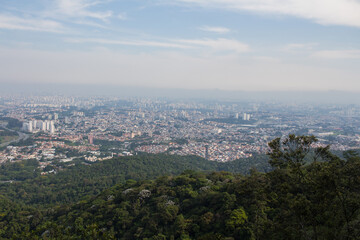 Fototapeta na wymiar Vista Oeste do Pico do Jaraguá - SAO PAULO, SP, BRAZIL - NOVEMBER 13, 2022: View of the west side of the city from Peak of Jaragua, with the Bandeirantes highway on the left.