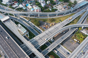 Multilevel junction motorway top view, Road traffic an important infrastructure in Thailand.Expressway Road and Roundabout. Transportation and travel concept.