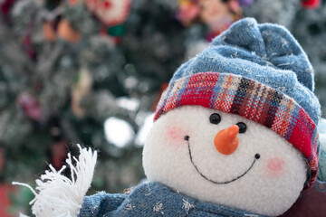 Smiling stuffed snowman