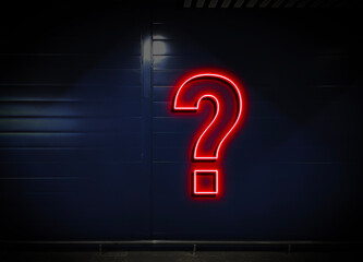 neon question mark sign attatched to the wall