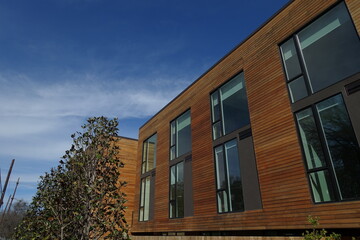 Brown building against blue clear skies.