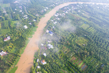 aerial view of white clouds and below is the Mekong river delta, South Vietnam. 