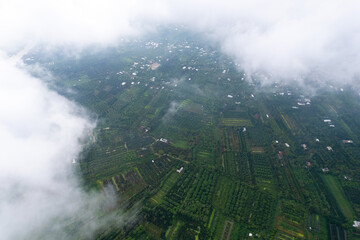 aerial view of white clouds and below is the Mekong river delta, South Vietnam. 