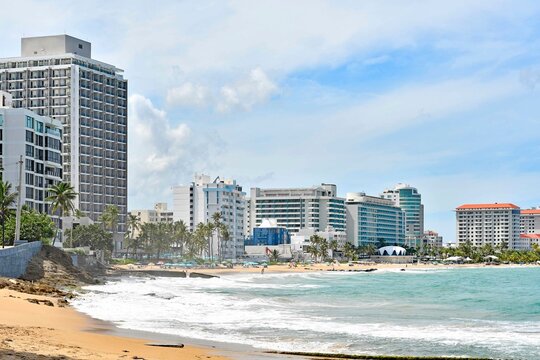 Beachfront resorts lining the Condado coastline in the metro area of San Juan on the island of Puerto Rico in the Caribbean.