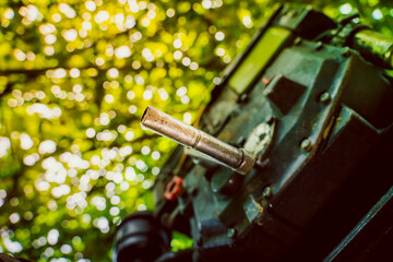 A manual starter in a walk-behind tractor engine for manually starting a diesel engine close-up on...