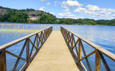 Obraz premium wooden bridge over the river
