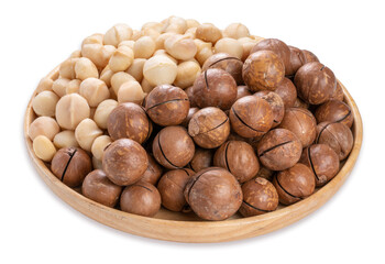 Macadamia nuts and Macadamia with hard shell on wooden background isolate on white with clipping path.