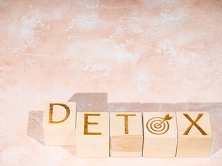 DETOX text on wood blocks as a body cleansing concept