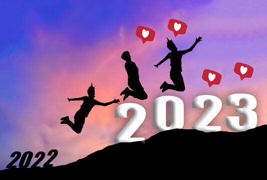 silhouette of happiness women jumping at amazing sunset background. New Year's concept. New year celebration in the beginning of 2023 for successful and happiness.