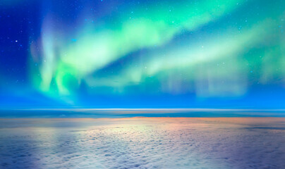 Amazing aurora borealis above the clouds