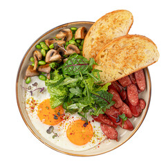 Classic english breakfast with fried eggs and sausages