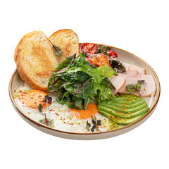 Portion of fried eggs breakfast with salad and avocado