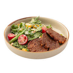 Portion of gourmet salad with roast beef