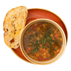 Portion of sorrel soup with grilled veal and toasted bread