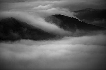 Fototapeta premium clouds over the fog