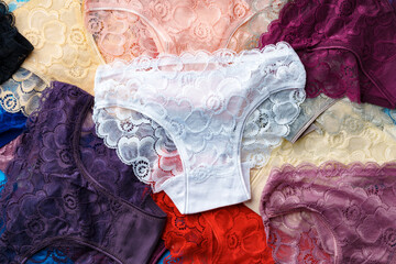 Women's panties set collection for background, top view - obrazy, fototapety, plakaty
