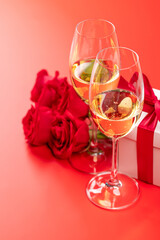 Valentines day card with champagne, rose flowers and gift box