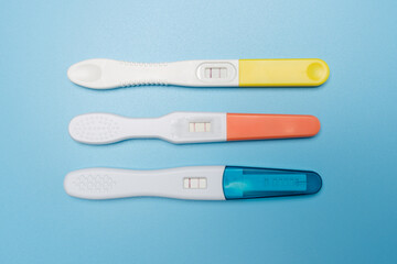 a pregnancy test on a blue background