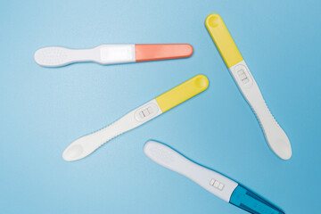 a pregnancy test on a blue background