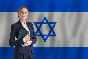Izraeli businesswoman on the flag of Izrael digital  nomad, business, startup concept - obrazy, fototapety, plakaty