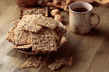 Obraz na płótnie Canvas Crispy crackers with sunflower seeds and flax seeds.