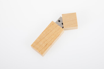 wooden USB flash drive key and cap storage for computer on grey background