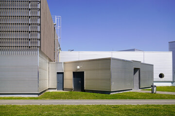 Fototapeta na wymiar large industrial warehouse building outdoor facade