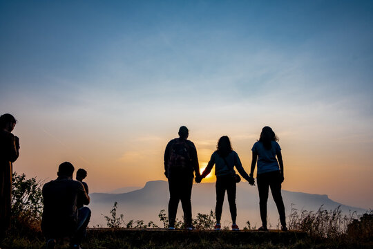family at sunset, harihar fort view