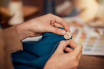 Womab, hands and sewing clothes button in studio for designer wear, fashion garment and creative...