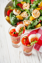 delicious summer gazpacho cocktail on a white wooden rustic background