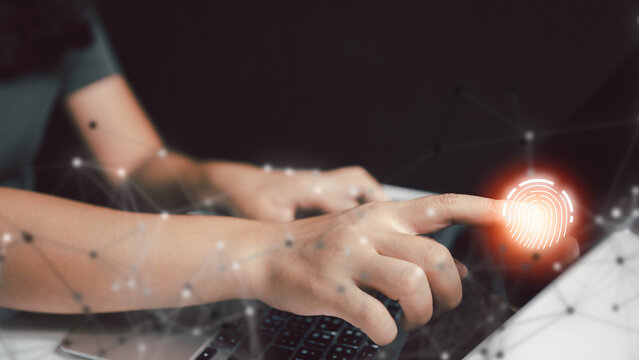 finger touching screen for futuristic digital processing of biometric identification fingerprint scanner. concept of surveillance and security scanning of digital programs cyber futuristic application